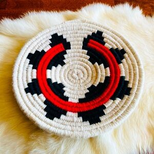 Navajo wedding basket. Hand woven. Measures 7 3/4” in diameter.